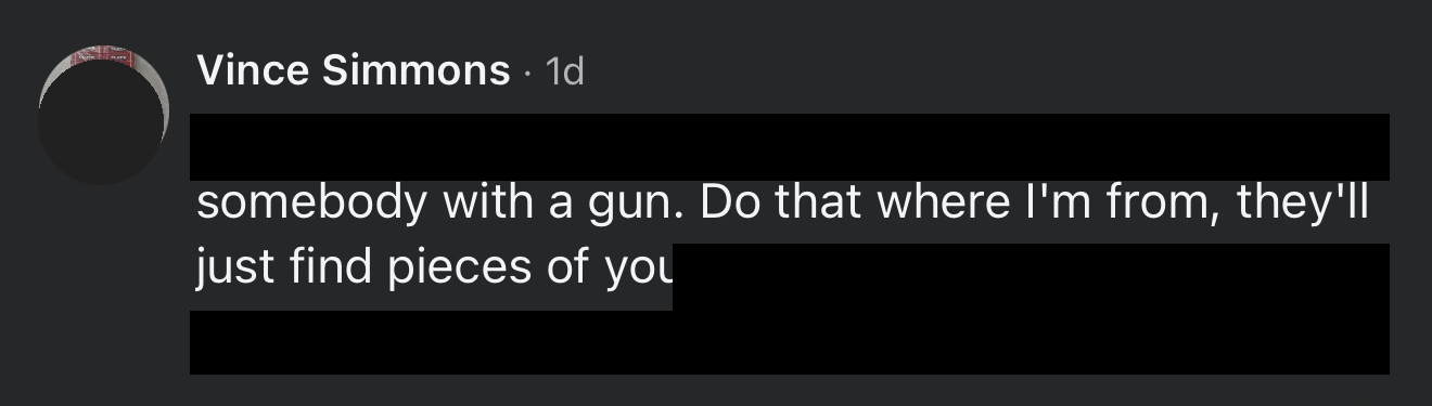 Redacted screenshot crop of a public Facebook comment by Vince Simmons. Profanity and slurs are blacked out. The visible threat says that somebody with a gun would have people "just find pieces of you."